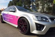 HOLDEN-COMMODORE-VE-ONWARDS-MATRIX-BLACK-PIPED-PINK